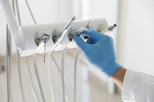 Professional Tooth Extraction technician working in Hainesville, IL